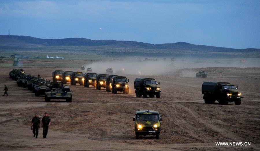 На полигон учений "Мирная миссия-2014" прибыли свыше 2200 военнослужащих из разных государств