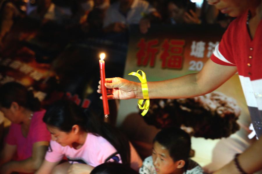 Молитва за пострадавших во взрыве в Тяньцзине