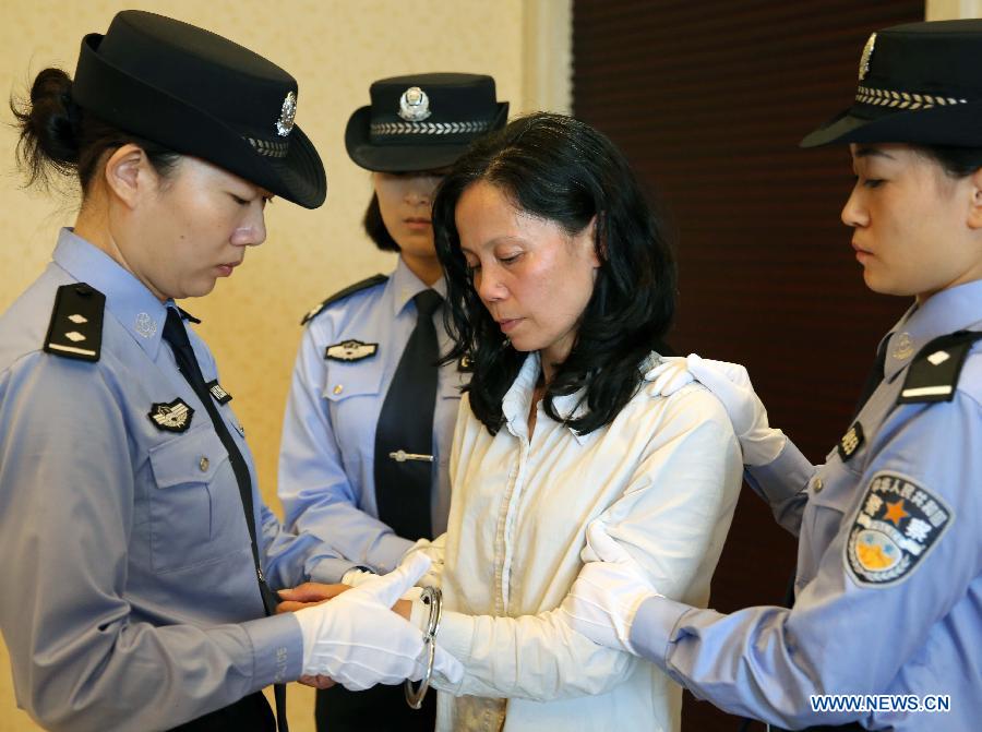 Из США экстрадирована Куан Ваньфан, подозреваемая в коррупции