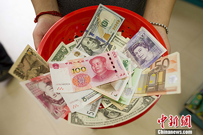 Комментарий: Включение китайского юаня в корзину СДР -- исторический и взаимовыгодный шаг для Китая и всего мира