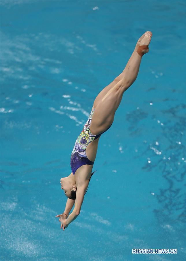 Китайская команда по прыжкам в воду провела первую тренировку в Рио