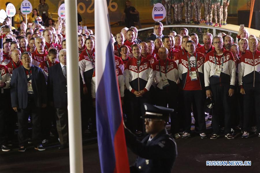 В олимпийской деревне состоялась церемония поднятия российского флага