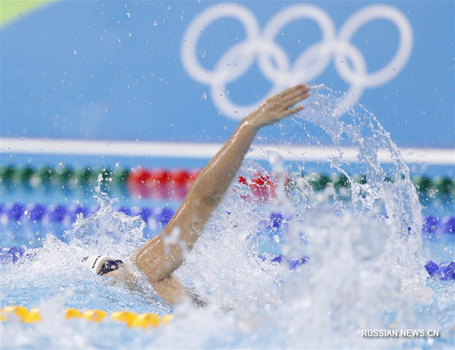 Китаянка Фу Юаньхуэй завоевала бронзовую медаль Олимпийских игр в заплыве на дистанции 100 метров на спине