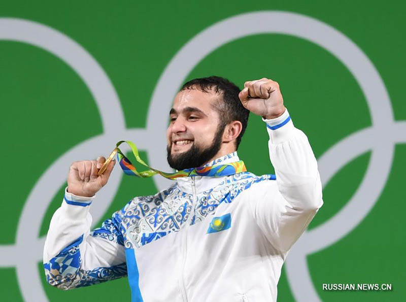 Казахстанский штангист Н. Рагимов стал олимпийским чемпионом в весе до 77 кг с мировым рекордом