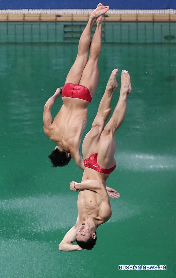 Китайцы Цинь Кай и Цао Юань завоевали бронзу в синхронных прыжках в воду с 3-метрового трамплина на Олимпиаде в Рио