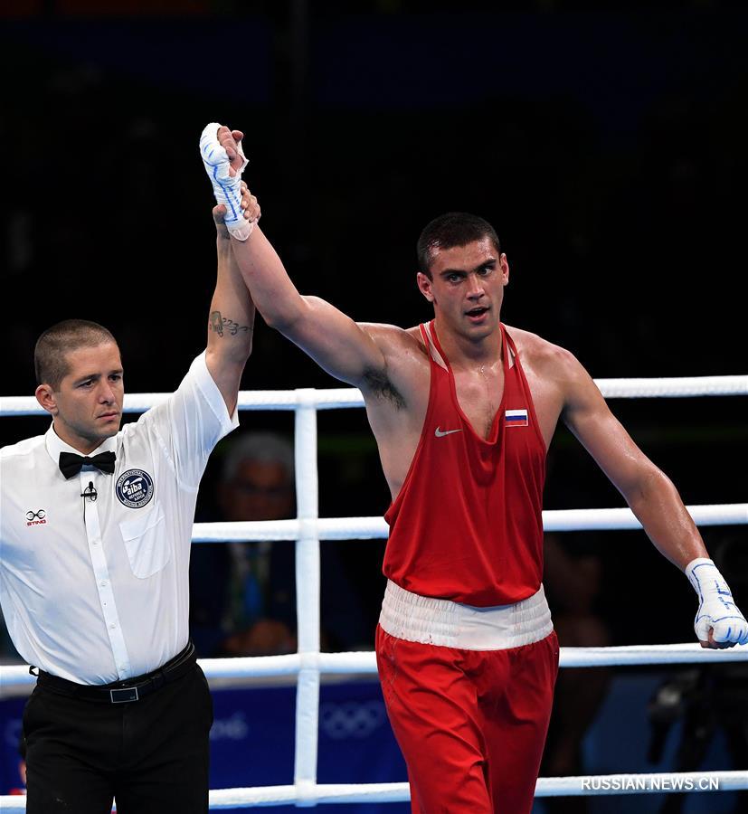 Российский боксер Е. Тищенко стал золотым призёром Олимпиады