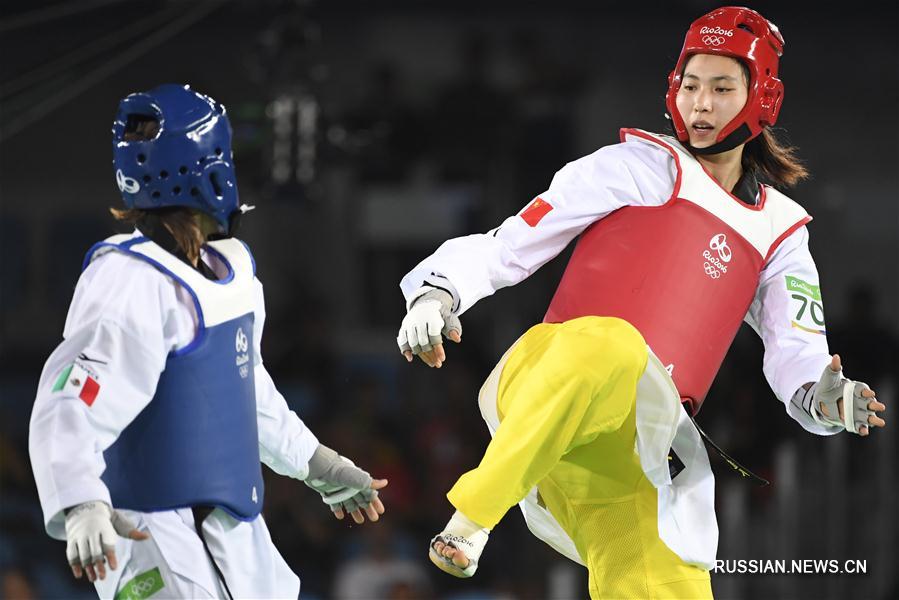 Китайская спортсменка Чжэн Шуинь завоевала золотую медаль ОИ по тхэквондо в весовой категории свыше 67 кг