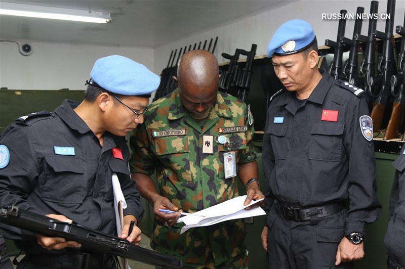 Пятая команда китайских полицейских миротворцев в Либерии успешно прошла инспекционную проверку состояния вооружений и военной техники