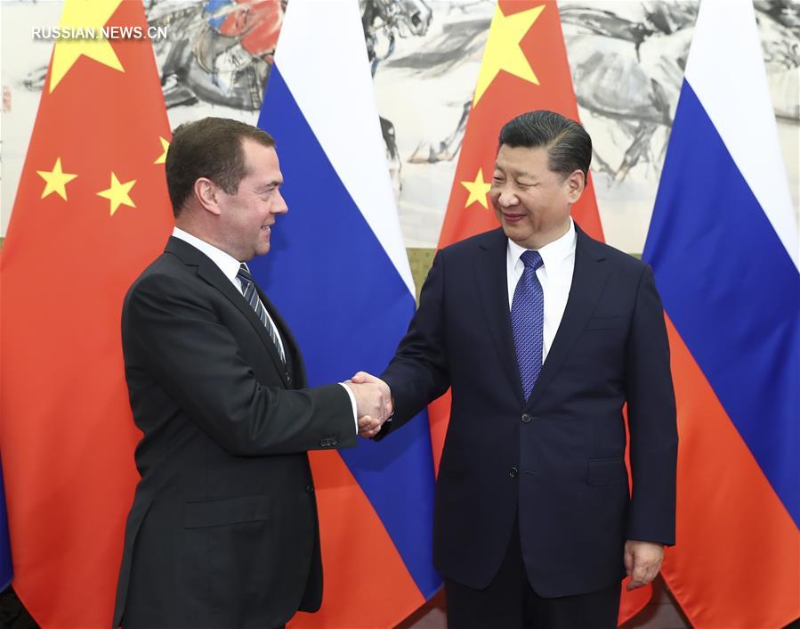 Си Цзиньпин отметил твердую решимость китайской стороны развивать и углублять отношения с Россией