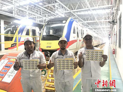 В Малайзии впервые выпущена почтовая марка в честь китайских моторвагонных поездов