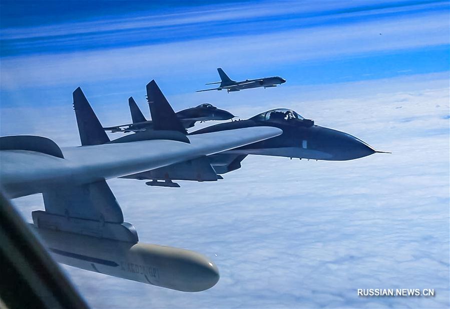 Китайские ВВС провели боевые учения в западной части Тихого океана и полет в регионе ЮКМ