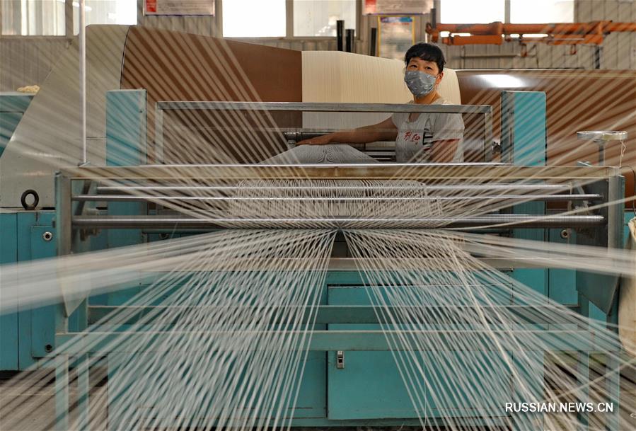 Укрупнение текстильного производства в уезде Сунин
