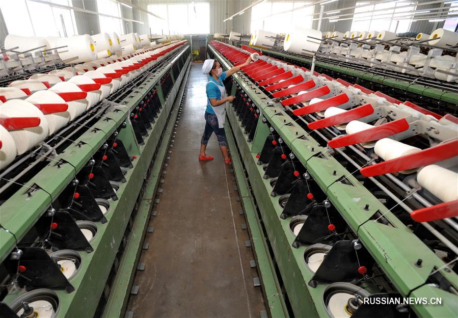 Укрупнение текстильного производства в уезде Сунин