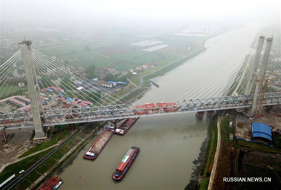Успешно выполнено смыкание крупного моста через реку Юйси на ВСЖД Шанцю-Хэфэй-Ханчжоу