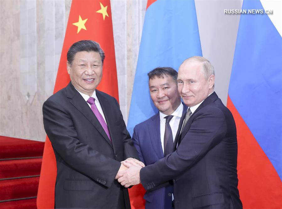 Си Цзиньпин принял участие в 5-й встрече руководителей Китая, России и Монголии
