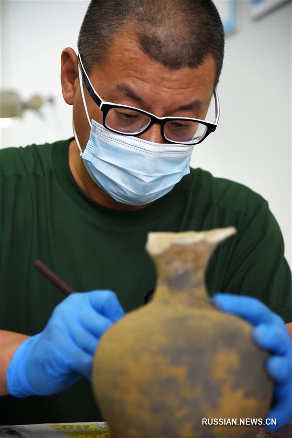 Началась реставрация археологических находок, сделанных при восстановлении русла реки Сяоцинхэ