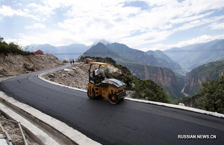 Открылось движение по дороге в последней в Китае деревне, обладающей условиями для прокладки дорог с твердым покрытием