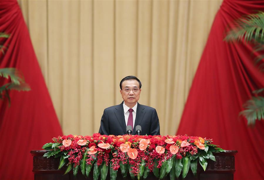 Госсовет КНР устроил торжественный прием по случаю Дня образования КНР